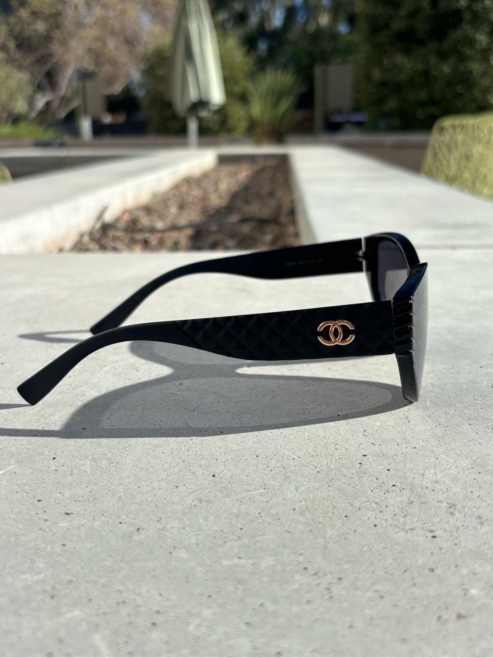 CHANEL Black Sunglasses with Gold CC Emblem - Picture 1 of 3